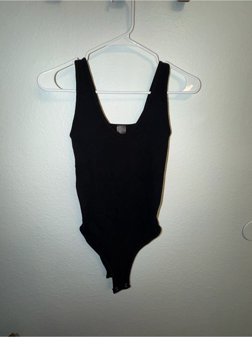 Classic Black Ribbed One-Piece Bodysuit